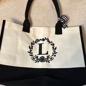 Elegant Black and White Tote Bag monogrammed with letter L canvas material